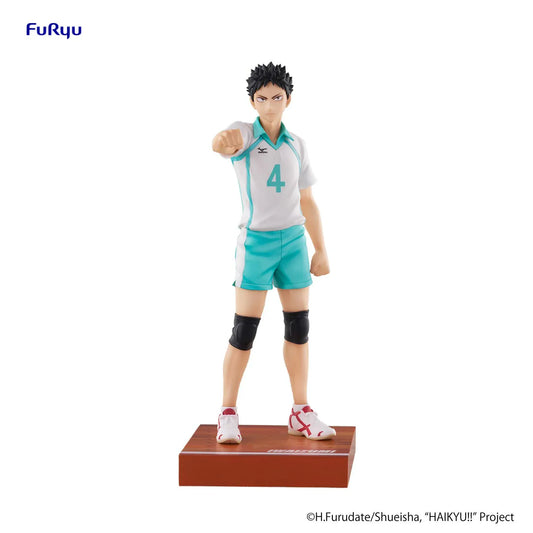 Hajime Iwaizumi figure wearing his white and turquoise number 4 volleyball uniform, extending one fist on a court-inspired base bearing his name.