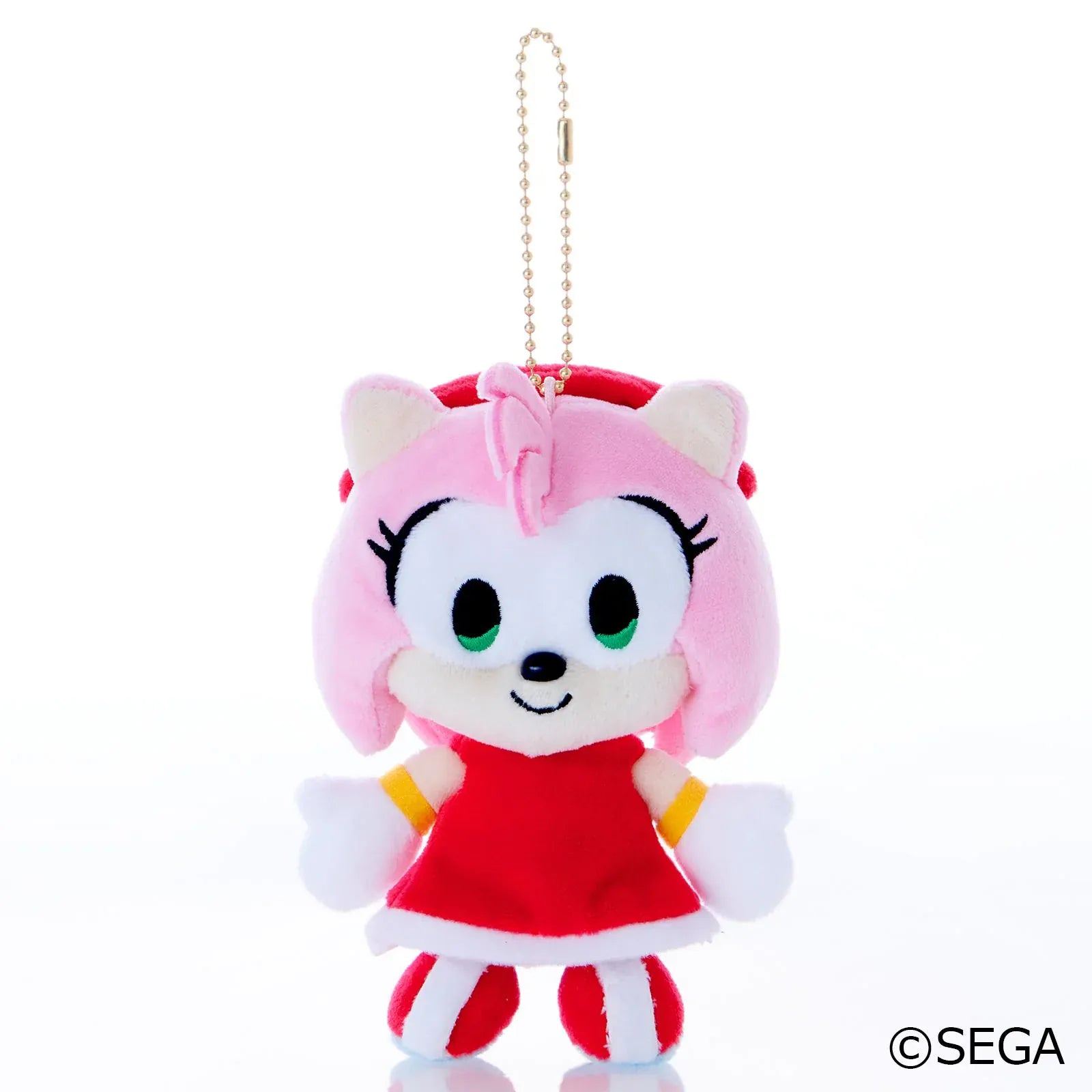 Sonic & Friends Amy mascot plush with green eyes, a red dress, red shoes, and an attached ball chain.