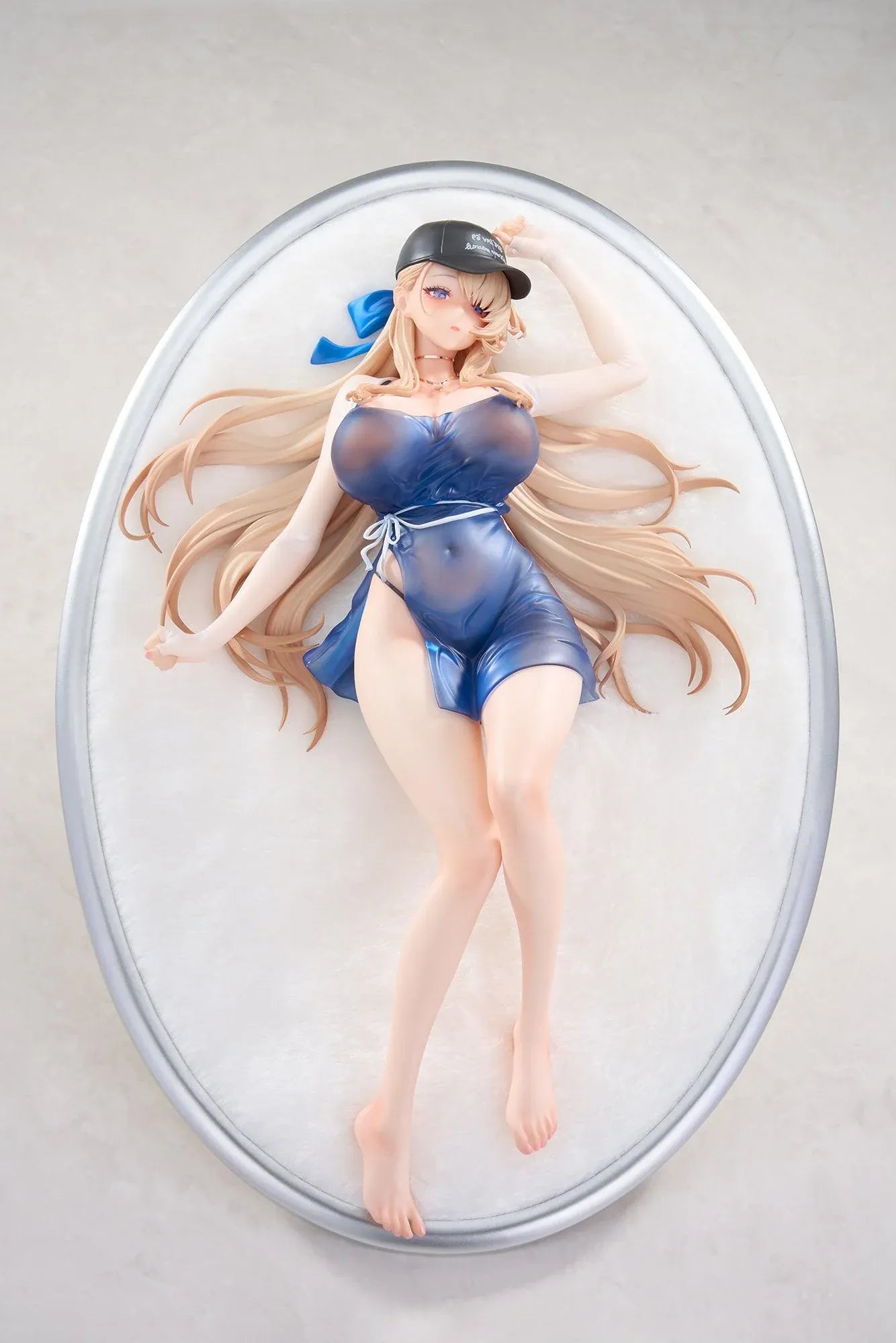 Brown Dust 2 Wilhelmina Water Park Queen 1/7 scale figure with bonus featuring Wilhelmina reclining on a cushion base in a translucent blue swimsuit with flowing blonde hair
