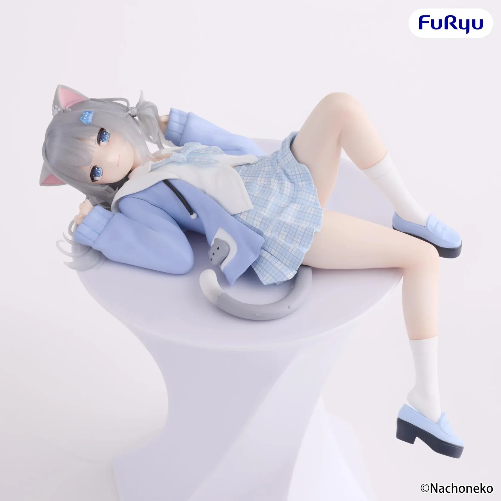 Nachoneko Noodle Stopper Figure by FuRyu featuring Nachoneko lying down in a blue outfit with cat ears and a cushion base.