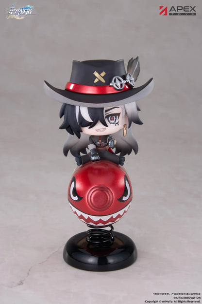 Honkai Star Rail Happy Shake Boothill Chibi Figure sitting on a red spring-mounted rocking base with his signature cowboy hat