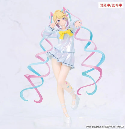 Prototype NEEDY GIRL OVERDOSE Vivit INTERNET ANGEL figure in a pale blue outfit with a yellow bow, spiraling pink-and-turquoise hair, and a peace-sign pose.