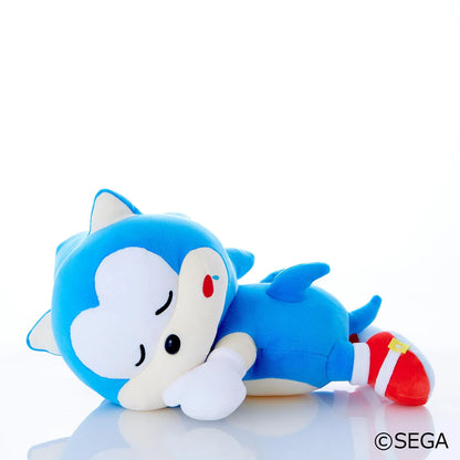 Sonic & Friends Sonic sleeping plush lying on his side with closed eyes, white gloves, and red shoes.