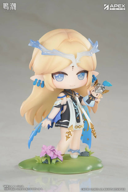 Chibi Cartethyia Jinseki Series figure with blonde hair, blue eyes, a pale blue headpiece, and a small armored companion, standing on a green floral base.