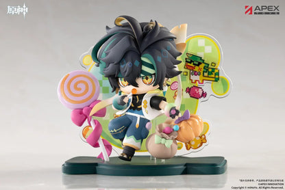 Genshin Impact You Ye Qi Xiang Series chibi Kinich figure holding a lollipop, surrounded by candy, a pumpkin, and a pixel-art backdrop.
