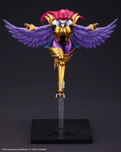 Harpie Lady figure posed in flight with outstretched purple wings, red hair, and gold Cyber Shield armor above a black display base.
