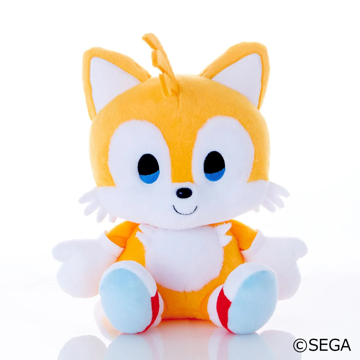 Sonic & Friends Tails medium plush with blue eyes, white gloves, red shoes, and twin tails.