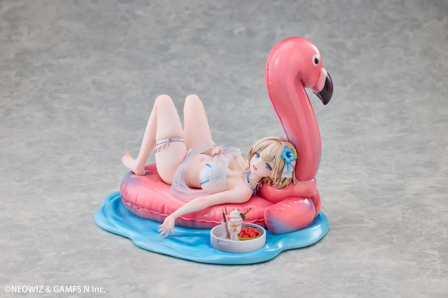 Brown Dust 2 Hot Summer Dream Justia 1/7 Scale Figure relaxing on a pink flamingo float with a water-themed display base
