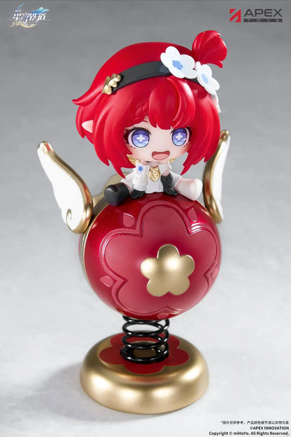 Honkai Star Rail Tribbie Chibi Chara Yurayura Stand Non-Scale Figure with red hair, flower details, red-and-gold spring base, and chibi design