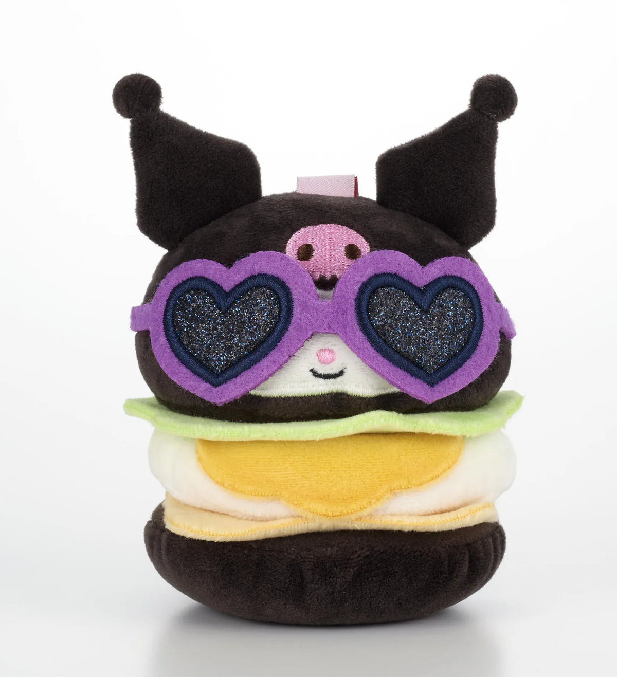 Kawaii YumYum MART DINER Kuromi Tsukimi Burger plushie featuring a fried egg-inspired filling, black buns, and sparkly purple heart-shaped sunglasses.