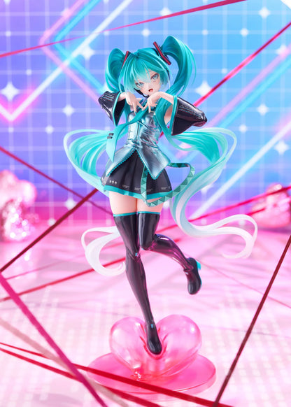 Hatsune Miku T-Most figure with flowing twin tails, classic Vocaloid outfit, and pink heart-shaped display base