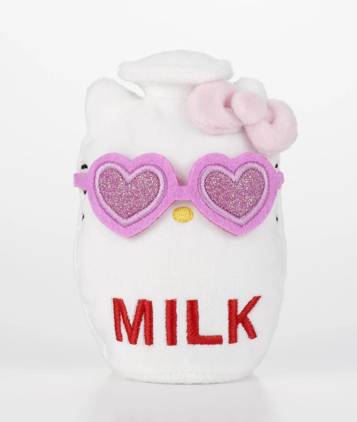 Kawaii YumYum MART DINER Hello Kitty Milk plushie shaped like a white milk bottle with red lettering, a pink bow, and sparkly heart-shaped sunglasses.