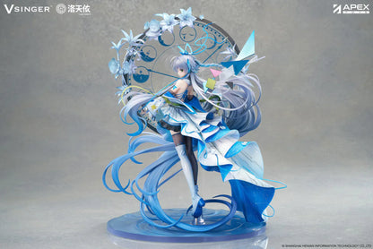 Vsinger Luo Tianyi 12th Anniversary 1/7 scale figure featuring flowing twin tails, layered blue and white dress, and ornate circular backdrop