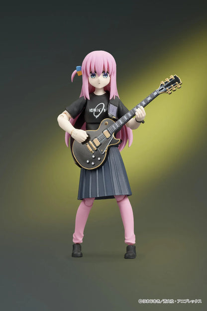 Bocchi the Rock! DIGACTION Hitori Gotoh figure holding a black and gold guitar, wearing a black band T-shirt, dark skirt, and pink leggings.