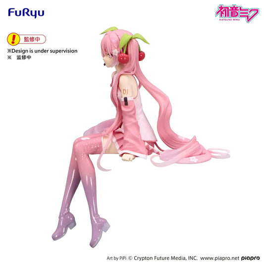 Sakura Miku 2026 Ver. noodle stopper figure sitting with long pink twin-tails, cherry hair accessories, and sakura-themed outfit draped over the edge.