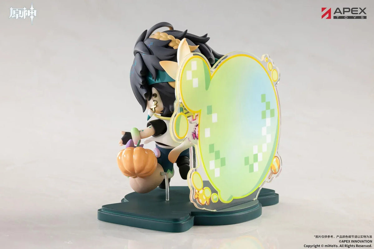 Genshin Impact You Ye Qi Xiang Series chibi Kinich figure holding a lollipop, surrounded by candy, a pumpkin, and a pixel-art backdrop.