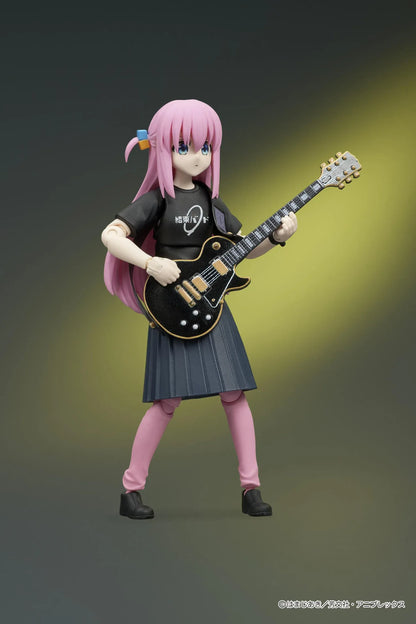 Bocchi the Rock! DIGACTION Hitori Gotoh figure holding a black and gold guitar, wearing a black band T-shirt, dark skirt, and pink leggings.