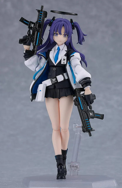 Blue Archive figma Yuuka Hayase Figure Rerelease featuring Yuuka with purple twin tails, academy-style outfit, halo detail, and tactical weapon accessories.