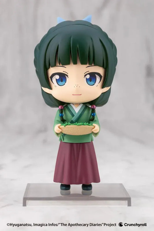 The Apothecary Diaries Oshi Works Mini Maomao Figure wearing a green outfit and holding a basket
