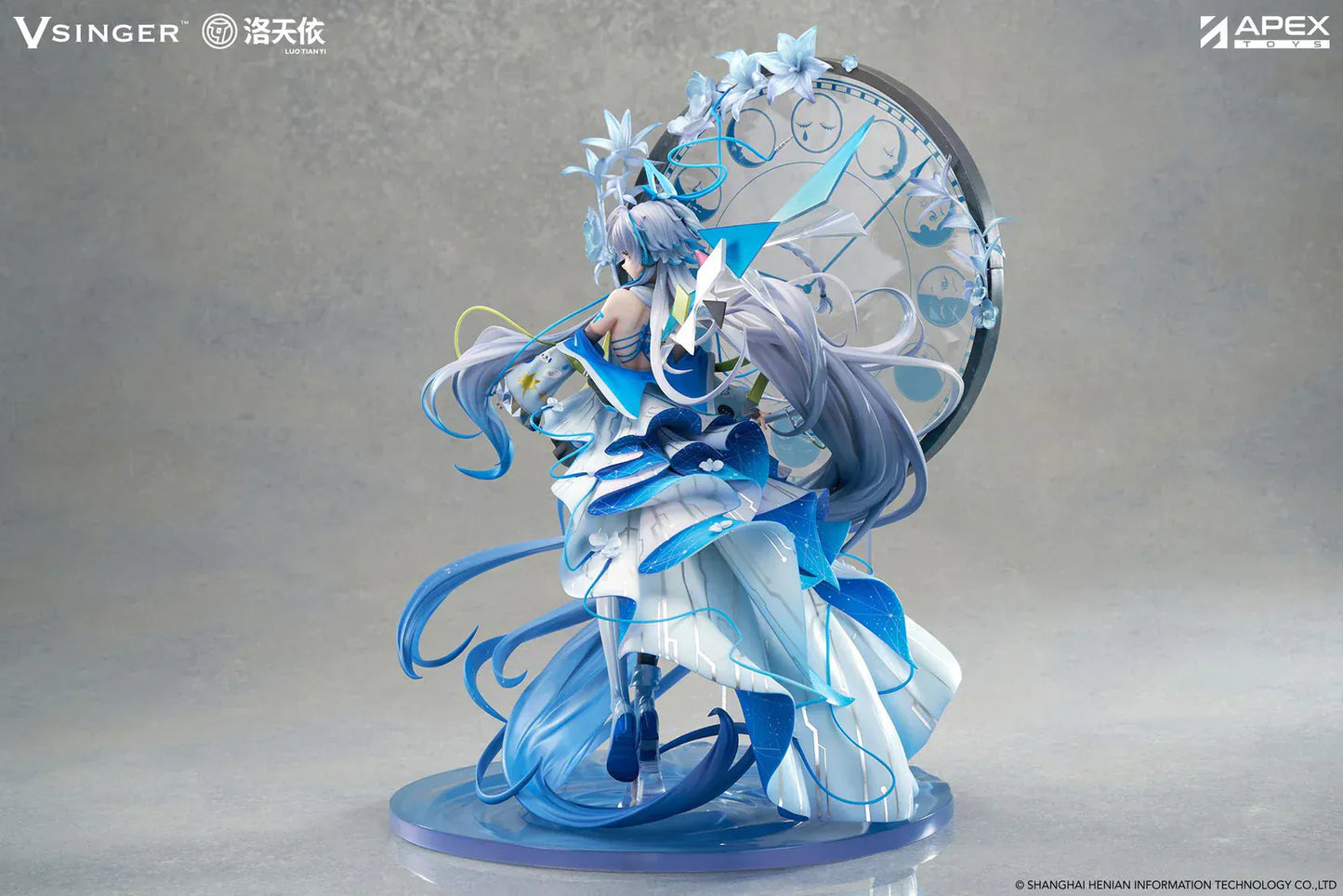 Vsinger Luo Tianyi 12th Anniversary 1/7 scale figure featuring flowing twin tails, layered blue and white dress, and ornate circular backdrop