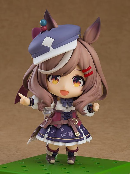 Umamusume Pretty Derby Nendoroid Matikanetannhauser Figure Rerelease featuring Matikanetannhauser with horse ears, brown hair, signature hat, race-inspired outfit, and cheerful pointing pose.