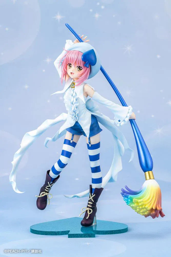 Amulet Spade 1/7 scale figure with pink hair, a white-and-blue costume, striped stockings, and an oversized rainbow-tipped paintbrush.