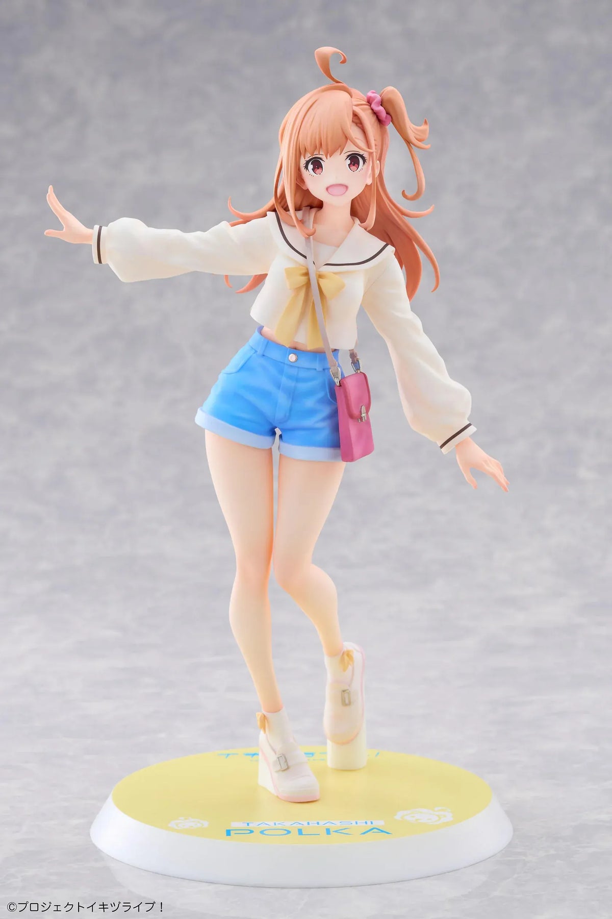Polka Takahashi 1/7 scale figure with orange hair, a white sailor-style top, blue shorts, and a pink shoulder bag, posed on a yellow base.