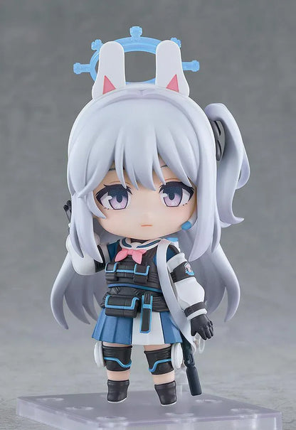 Blue Archive Nendoroid Miyako Tsukiyuki with silver hair, rabbit-ear headband, blue halo, white jacket, blue skirt, and black tactical gear.
