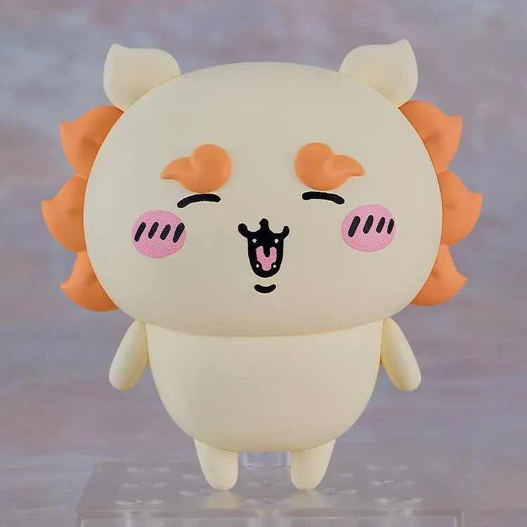 Chiikawa Nendoroid Shisa figure with a cream-colored body, orange mane and eyebrows, pink cheeks, and a joyful smiling expression.