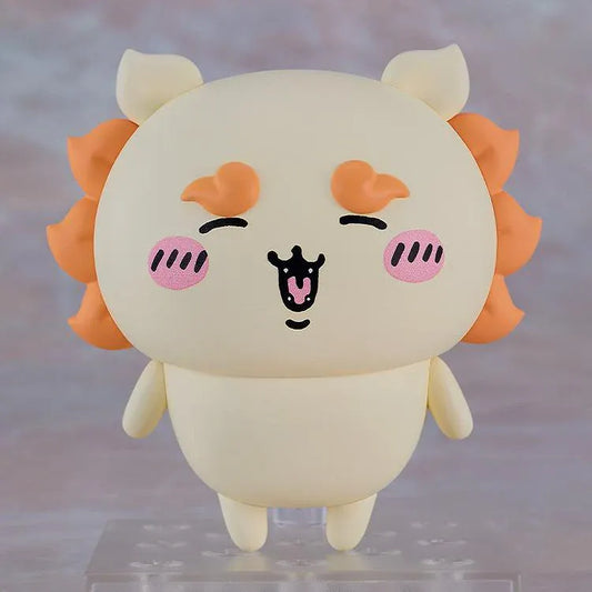 Chiikawa Nendoroid Shisa figure with a cream-colored body, orange mane and eyebrows, pink cheeks, and a joyful smiling expression.