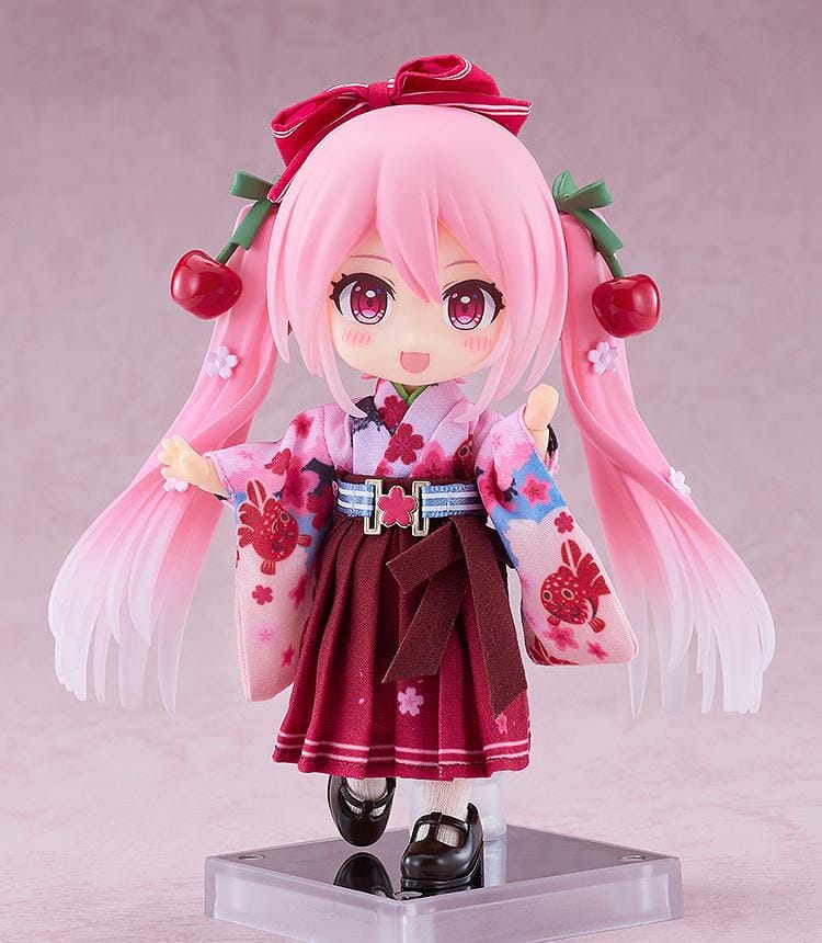 Hatsune Miku Nendoroid Doll Sakura Miku Hirohako 2025 Ver. Hirosaki featuring Sakura Miku with pink twin tails, cherry accessories, and a red and pink kimono-style outfit.