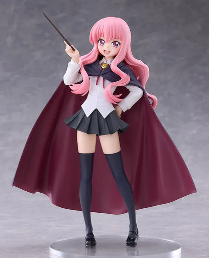 POP UP PARADE Louise L Size figure with flowing pink hair, a raised wand, white blouse, dark skirt, and a cape with burgundy lining.