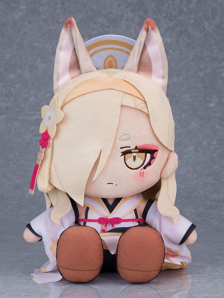 Blue Archive Chocopuni Kaho plushie seated with blonde hair covering one eye, tall animal ears, a halo, and a lavender outfit with pink cords.