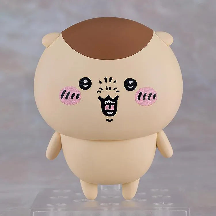 Chiikawa Nendoroid Kurimanju Figure featuring a round beige character with a chestnut-brown head, rosy pink cheeks, expressive black eyes, an open mouth, tiny arms, and small feet.