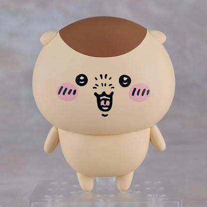 Chiikawa Nendoroid Kurimanju Figure featuring a round beige character with a chestnut-brown head, rosy pink cheeks, expressive black eyes, an open mouth, tiny arms, and small feet.