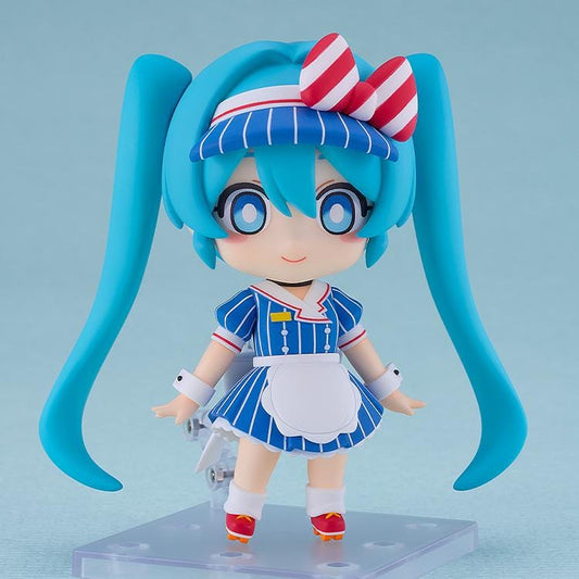 Hatsune Miku Nendoroid Hatsune Miku Mesmerizer Ver. Figure featuring Miku in a chibi-style design with teal twin tails, striped blue outfit, red and white bow, and apron-style details.