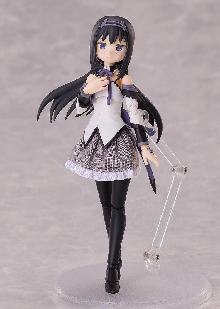 Puella Magi Madoka Magica The Movie Walpurgisnacht Rising BUZZmod. Homura Akemi 1/12 Scale Action Figure featuring long black hair, purple eyes, a white and purple magical girl outfit, fabric skirt, articulated joints, and a circular display base.