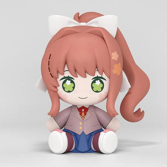 Doki Doki Literature Club! Huggy Good Smile Monika figure with green flower-filled eyes, a white hair bow, and a school uniform in a seated pose.