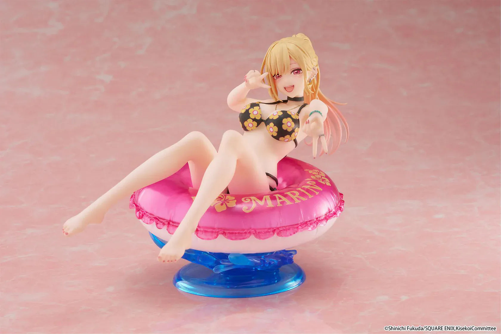 My Dress-Up Darling Aqua Float Girls Marin Kitagawa Figure Rerelease featuring Marin relaxing on a pink swim float with floral swimsuit and translucent water-style base.