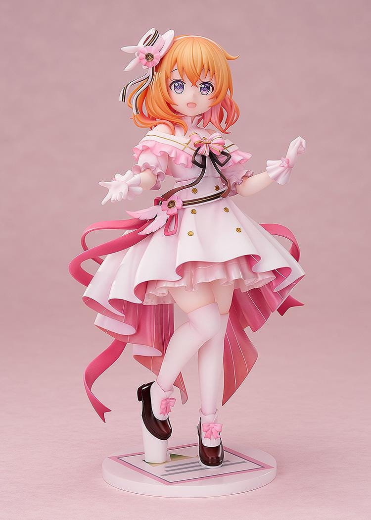 Is the Order a Rabbit Cocoa Dress Ver. 1/7 Scale Figure wearing an elegant pink and white frilled dress with ribbons and floral accessories