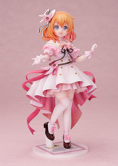 Is the Order a Rabbit Cocoa Dress Ver. 1/7 Scale Figure wearing an elegant pink and white frilled dress with ribbons and floral accessories