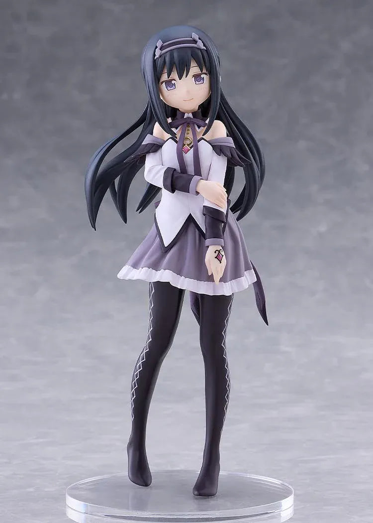 Homura Akemi figure with long black hair, violet eyes, a white and purple outfit, and diamond-patterned stockings, smiling with one hand resting on her arm.