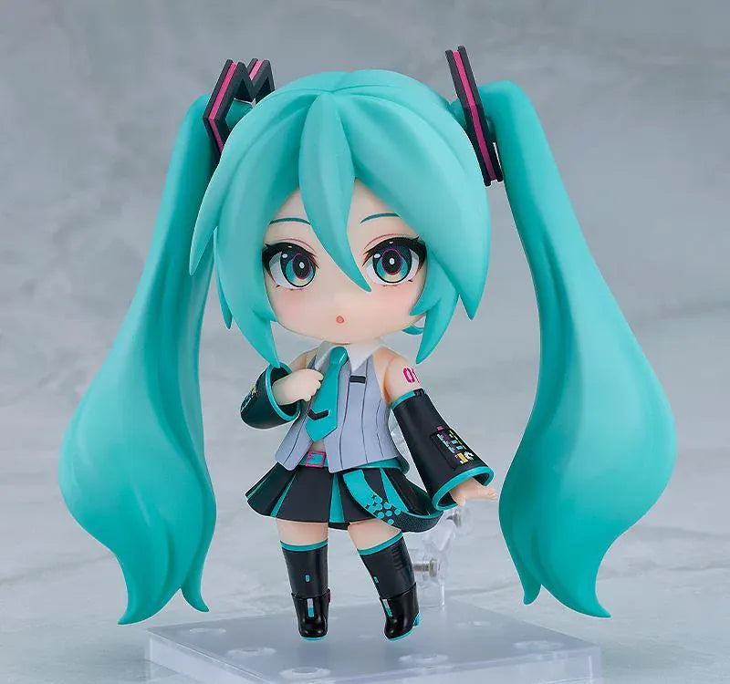 Hatsune Miku V6 Nendoroid figure with turquoise twin tails, an updated outfit, and interchangeable accessories.