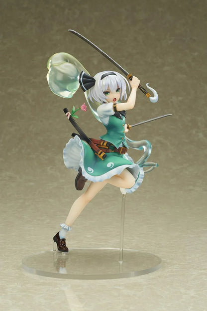 Touhou Project Youmu Konpaku figure wielding two swords in an airborne pose, wearing a green outfit with a translucent swirling spirit effect.