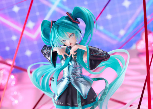 Hatsune Miku T-Most figure with flowing twin tails, classic Vocaloid outfit, and pink heart-shaped display base