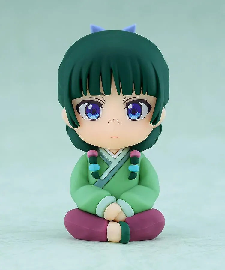 The Apothecary Diaries Nendoroid Plus Maomao rubber mascot seated in a green palace attendant outfit.