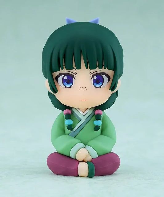 The Apothecary Diaries Nendoroid Plus Maomao rubber mascot seated in a green palace attendant outfit.