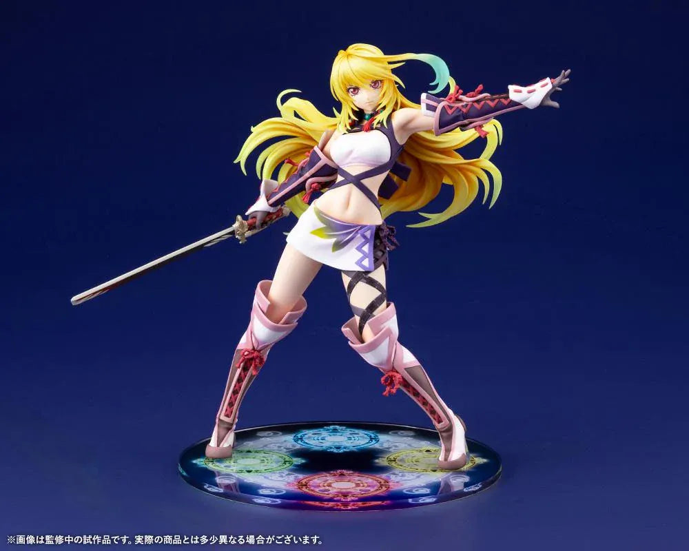 Tales of Xillia Milla Maxwell 1/8 scale figure holding a sword in a battle pose on a colorful elemental display base.
