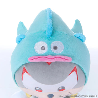 Sonic & Friends x Sanrio Shadow medium plush wearing an aqua Hangyodon hood with wide eyes, pink lips, and side fins.
