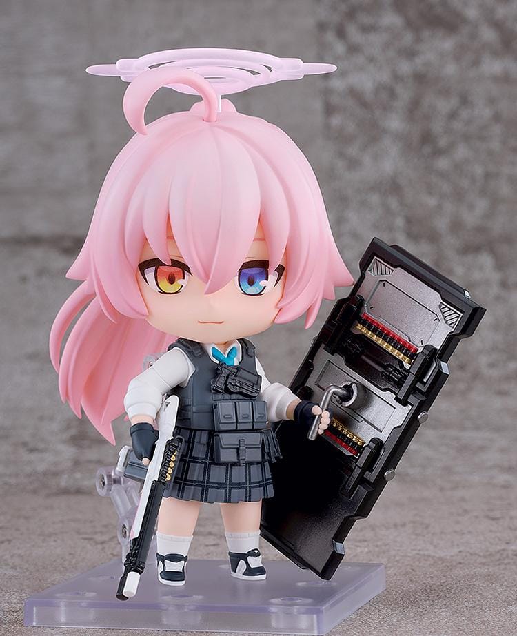 Blue Archive Nendoroid Hoshino Takanashi Armed Figure featuring Hoshino with pink hair, halo detail, tactical gear, weapon accessory, and large shield.